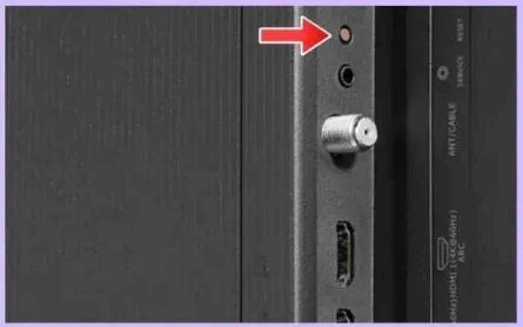 Showing the reset button on the back side of a Hisense Roku TV